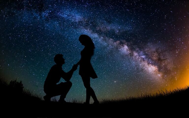 Couple under night sky
