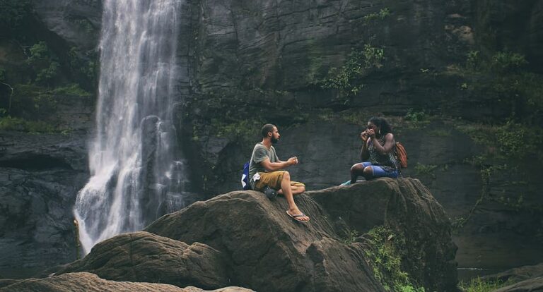 couple near waterfall