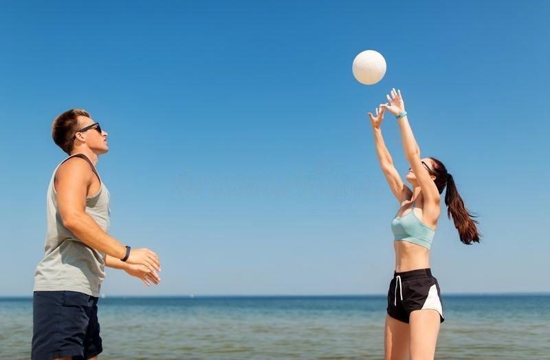 couple playing volleyball